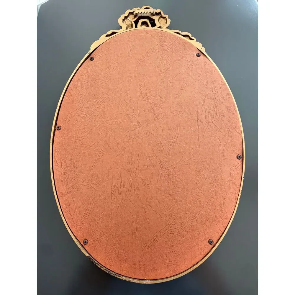 Vintage Hollywood Regency style mirror gold classic leaf wreath and ribbon crest